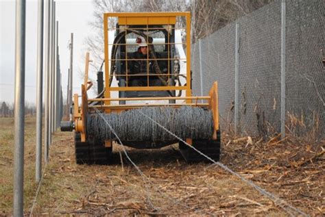 skid steer barb wire roller|barb wire fence winders.